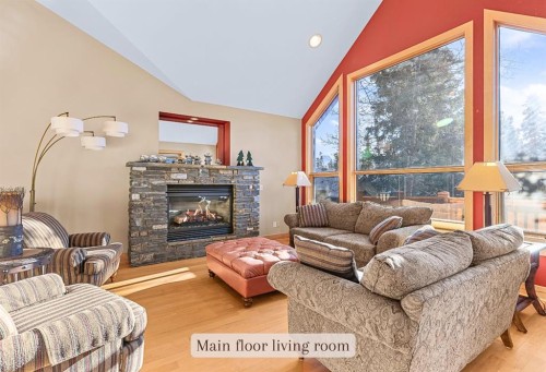 1-125 Stonecreek Road, Canmore, AB - Indoor Photo Showing Living Room With Fireplace