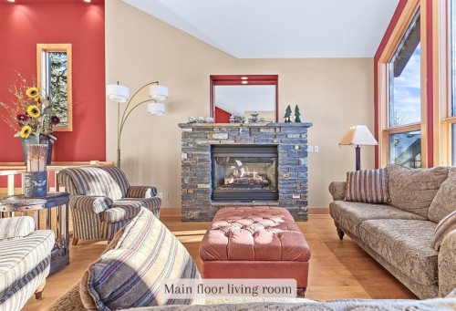 1-125 Stonecreek Road, Canmore, AB - Indoor Photo Showing Living Room With Fireplace