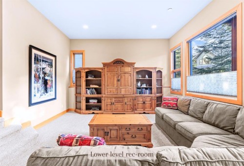1-125 Stonecreek Road, Canmore, AB - Indoor Photo Showing Living Room