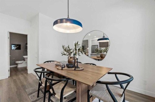 132 Quesnay Wood Link Sw, Calgary, AB - Indoor Photo Showing Dining Room