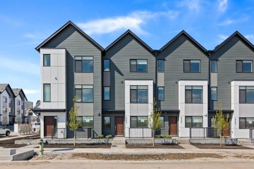 132 Quesnay Wood Link Sw, Calgary, AB - Outdoor With Facade