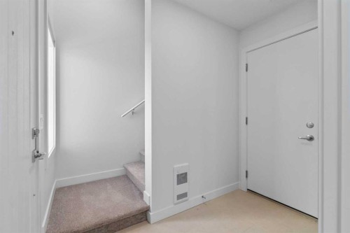 132 Quesnay Wood Link Sw, Calgary, AB - Indoor Photo Showing Other Room