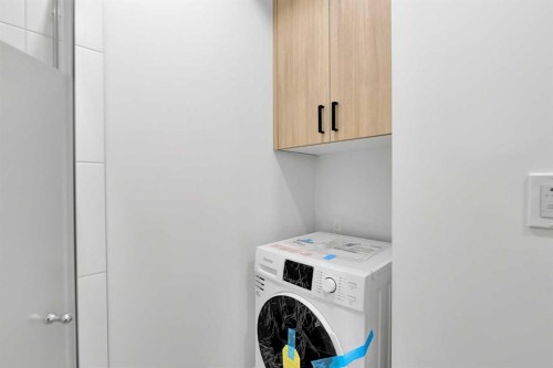 1820 Home Road Nw, Calgary, AB - Indoor Photo Showing Laundry Room