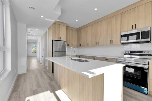 1820 Home Road Nw, Calgary, AB - Indoor Photo Showing Kitchen With Double Sink