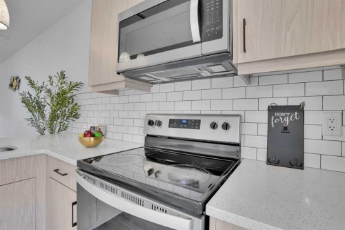 131 Lucas Boulevard, Calgary, AB - Indoor Photo Showing Kitchen With Upgraded Kitchen