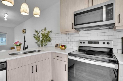 131 Lucas Boulevard, Calgary, AB - Indoor Photo Showing Kitchen With Double Sink