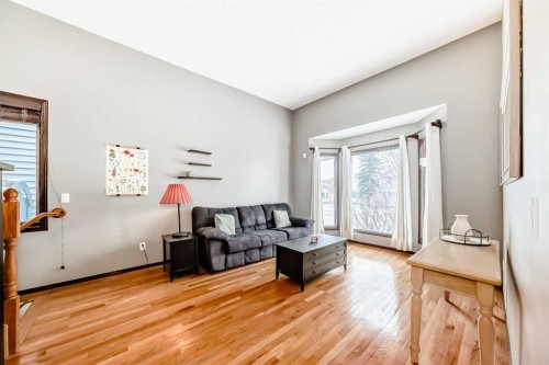 219 Sandstone Drive Nw, Calgary, AB - Indoor Photo Showing Living Room