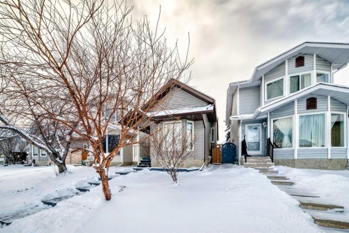219 Sandstone Drive Nw, Calgary, AB - Outdoor With Facade