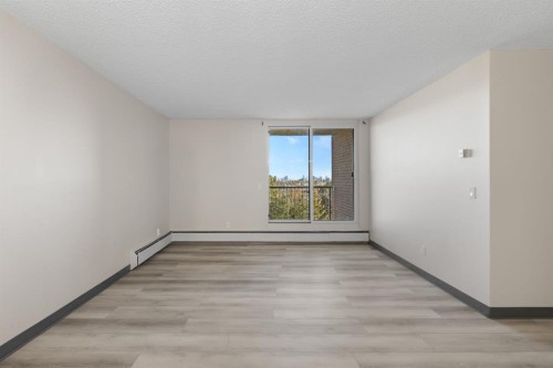 704-4944 Dalton Drive Nw, Calgary, AB - Indoor Photo Showing Other Room