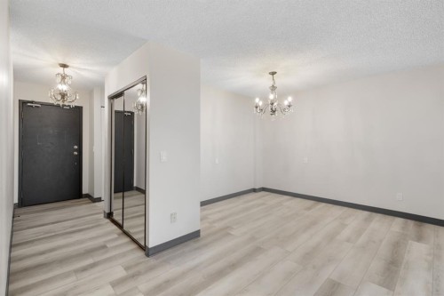 704-4944 Dalton Drive Nw, Calgary, AB - Indoor Photo Showing Other Room