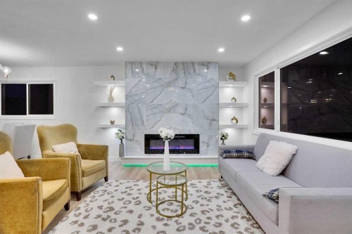 52 Franklin Drive Se, Calgary, AB - Indoor Photo Showing Living Room With Fireplace