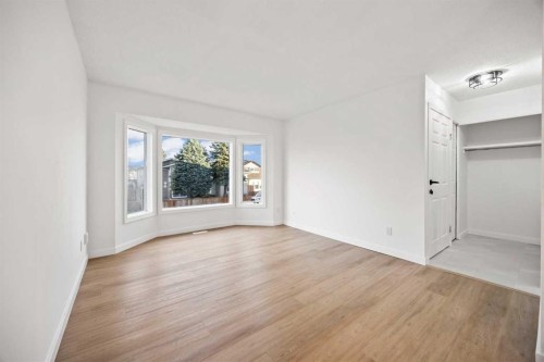 212 Falmere Way Ne, Calgary, AB - Indoor Photo Showing Living Room