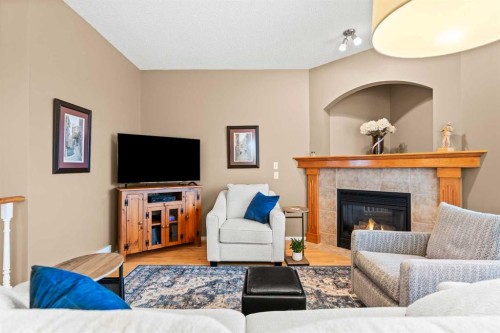101 Chaparral Villas Se, Calgary, AB - Indoor Photo Showing Living Room With Fireplace
