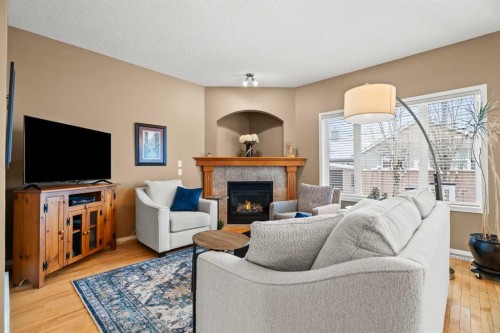 101 Chaparral Villas Se, Calgary, AB - Indoor Photo Showing Living Room With Fireplace