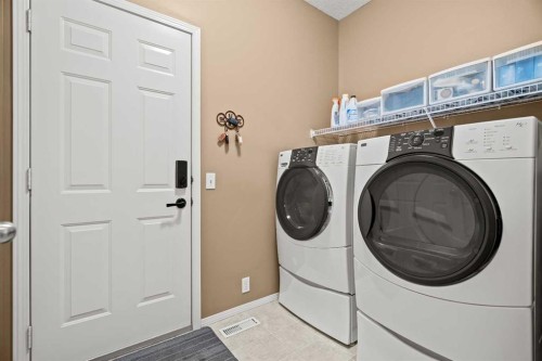 101 Chaparral Villas Se, Calgary, AB - Indoor Photo Showing Laundry Room