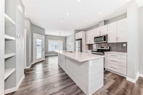 45 Ellington Crescent, Red Deer, AB - Indoor Photo Showing Kitchen With Stainless Steel Kitchen With Upgraded Kitchen
