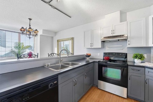 708-108 15 Avenue Se, Calgary, AB - Indoor Photo Showing Kitchen With Double Sink
