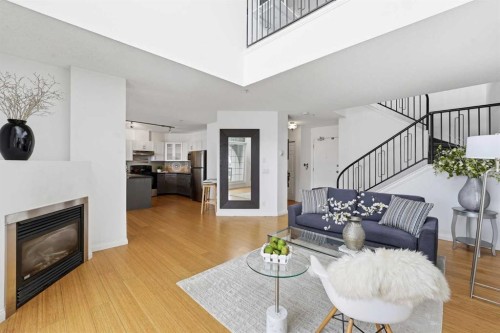 708-108 15 Avenue Se, Calgary, AB - Indoor Photo Showing Living Room With Fireplace