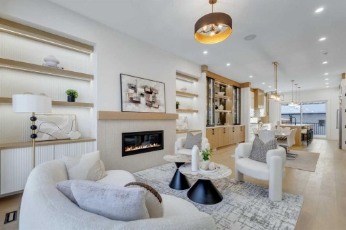 631 21 Avenue Nw, Calgary, AB - Indoor Photo Showing Living Room With Fireplace