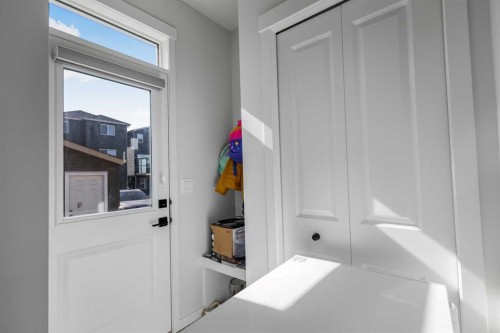 15 Edith Passage Nw, Calgary, AB - Indoor Photo Showing Other Room