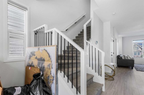 15 Edith Passage Nw, Calgary, AB - Indoor Photo Showing Other Room