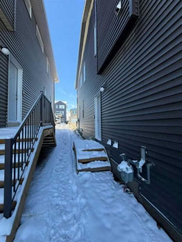 15 Edith Passage Nw, Calgary, AB - Outdoor With Exterior