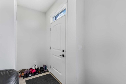 15 Edith Passage Nw, Calgary, AB - Indoor Photo Showing Other Room
