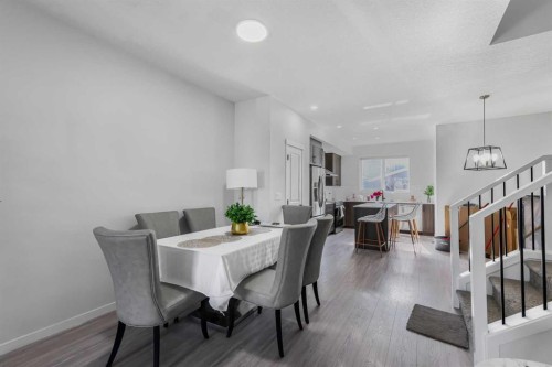 15 Edith Passage Nw, Calgary, AB - Indoor Photo Showing Dining Room
