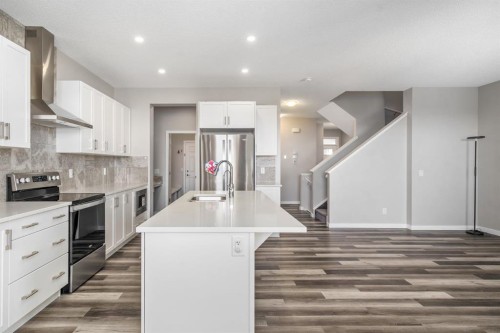 185 Masters Row Se, Calgary, AB - Indoor Photo Showing Kitchen With Stainless Steel Kitchen With Upgraded Kitchen