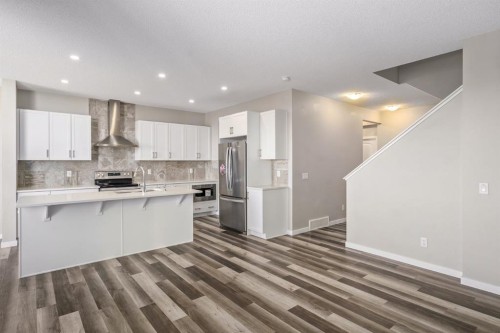 185 Masters Row Se, Calgary, AB - Indoor Photo Showing Kitchen With Stainless Steel Kitchen With Upgraded Kitchen
