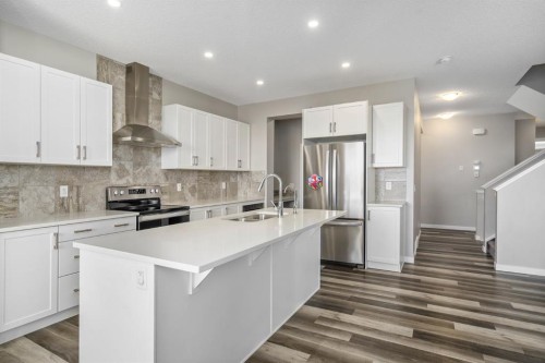 185 Masters Row Se, Calgary, AB - Indoor Photo Showing Kitchen With Stainless Steel Kitchen With Double Sink With Upgraded Kitchen