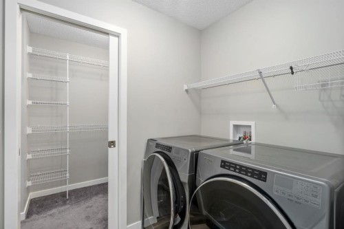 185 Masters Row Se, Calgary, AB - Indoor Photo Showing Laundry Room