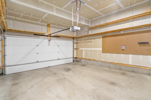 185 Masters Row Se, Calgary, AB - Indoor Photo Showing Garage