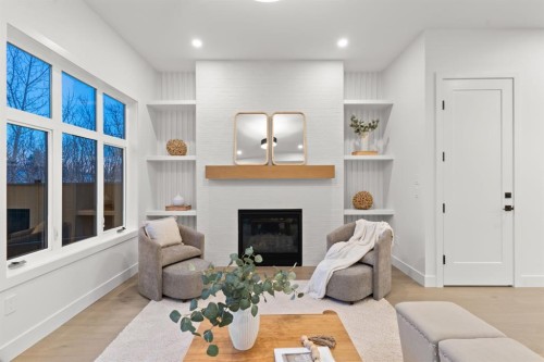610 24A Street Nw, Calgary, AB - Indoor With Fireplace