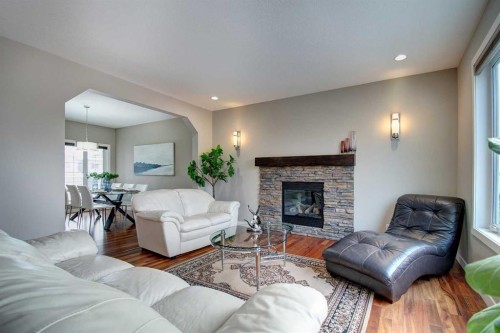 1796 Panatella Boulevard Nw, Calgary, AB - Indoor Photo Showing Living Room With Fireplace
