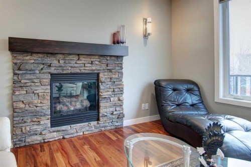 1796 Panatella Boulevard Nw, Calgary, AB - Indoor Photo Showing Living Room With Fireplace