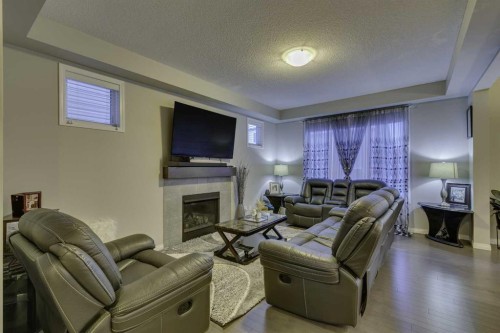 61 Cityscape View Ne, Calgary, AB - Indoor Photo Showing Living Room With Fireplace
