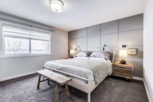 42 Cranford Gardens Se, Calgary, AB - Indoor Photo Showing Bedroom