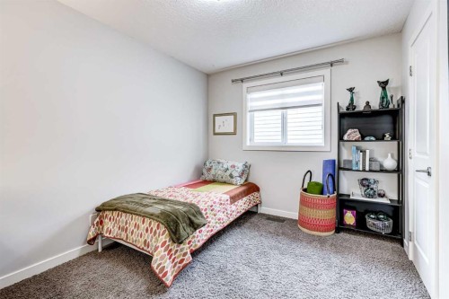 42 Cranford Gardens Se, Calgary, AB - Indoor Photo Showing Bedroom