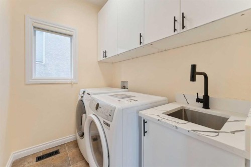 20 Sherwood Circle Nw, Calgary, AB - Indoor Photo Showing Laundry Room