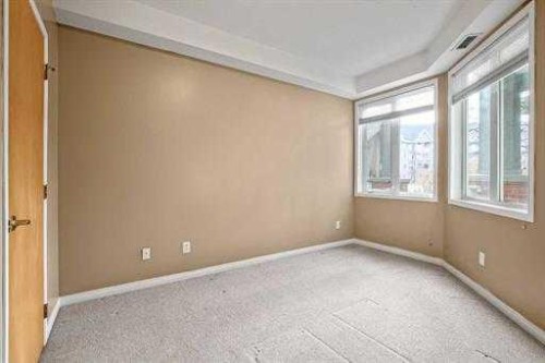 108-15 Everstone Drive Sw, Calgary, AB - Indoor Photo Showing Other Room