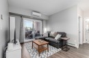 103-150 Auburn Meadows Manor Se, Calgary, AB  - Indoor Photo Showing Living Room 