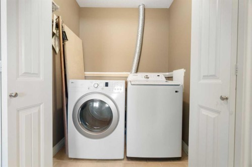 17 Deer Coulee Drive, Didsbury, AB - Indoor Photo Showing Laundry Room