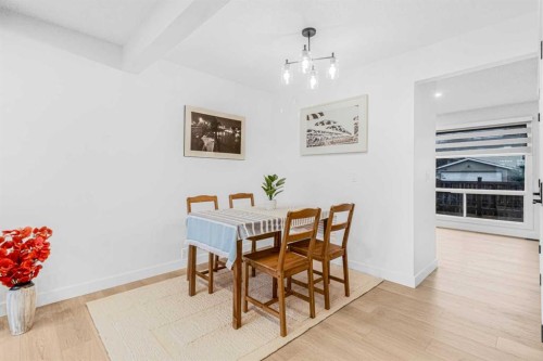 2-112 Erin Grove Close Se, Calgary, AB - Indoor Photo Showing Dining Room