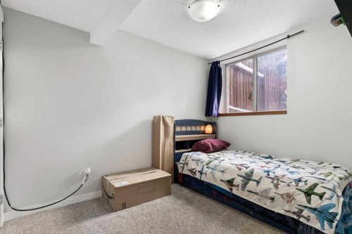 37 Benchlands Drive, Cochrane, AB - Indoor Photo Showing Bedroom