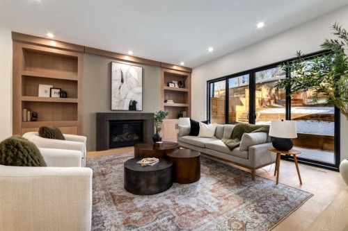 4834 22 Avenue Nw, Calgary, AB - Indoor Photo Showing Living Room With Fireplace