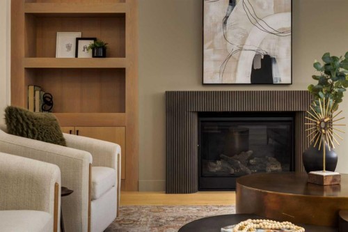 4834 22 Avenue Nw, Calgary, AB - Indoor Photo Showing Living Room With Fireplace