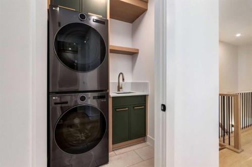 4834 22 Avenue Nw, Calgary, AB - Indoor Photo Showing Laundry Room