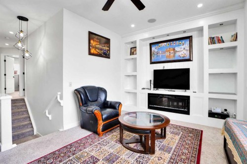 85 Saddlebrook Circle Ne, Calgary, AB - Indoor With Fireplace