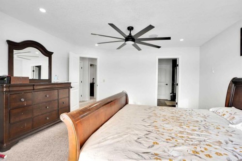 85 Saddlebrook Circle Ne, Calgary, AB - Indoor Photo Showing Bedroom